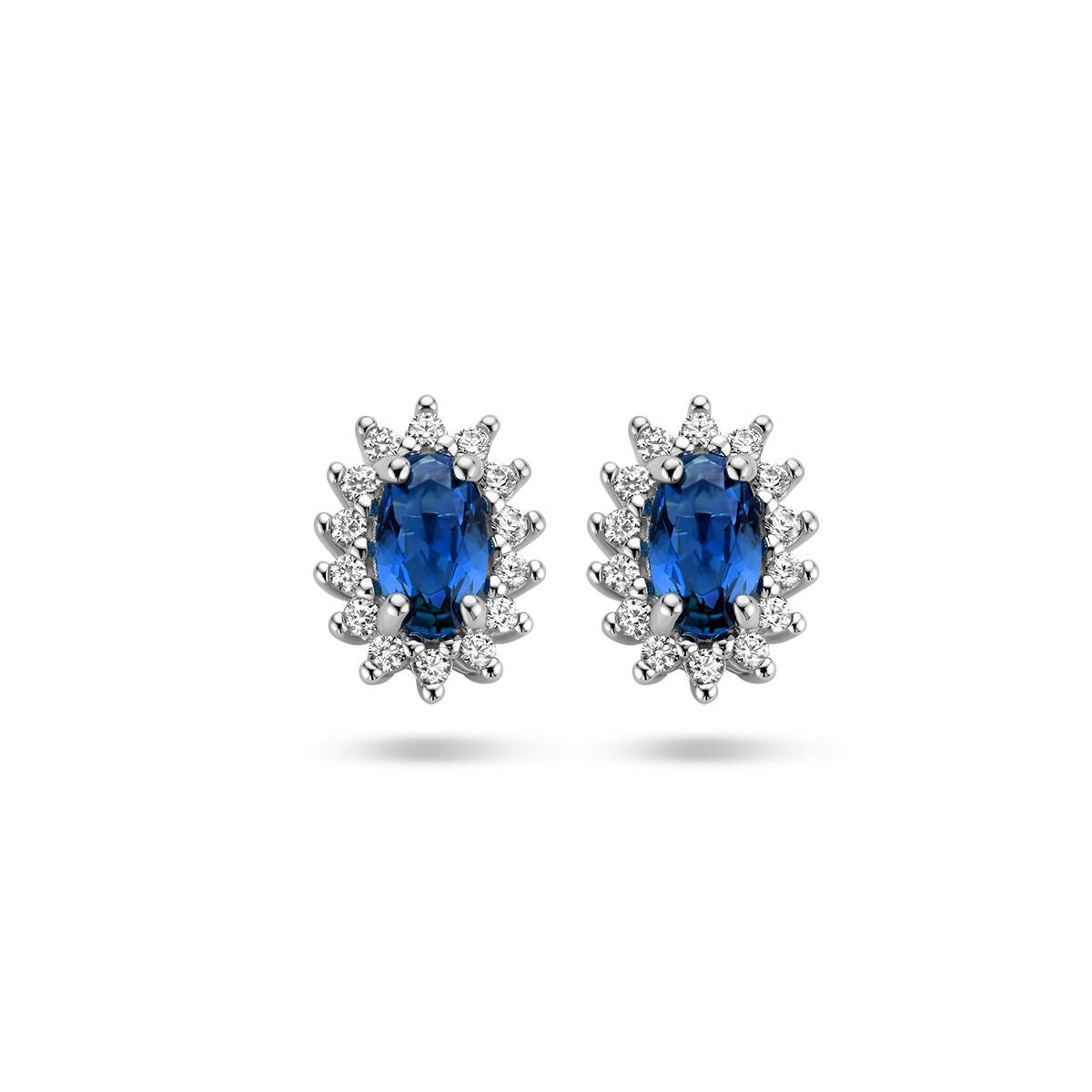 Boucles d'oreilles en argent rhodié avec saphir synthétique et halo de zirconia.
