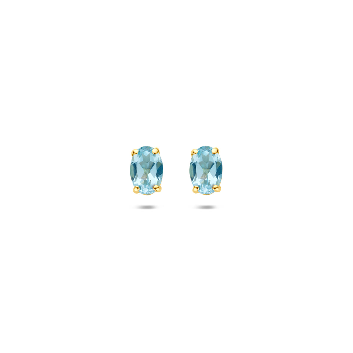 Boucles d'oreilles en or jaune 9 carats avec topazes bleues ovales de 6 mm.