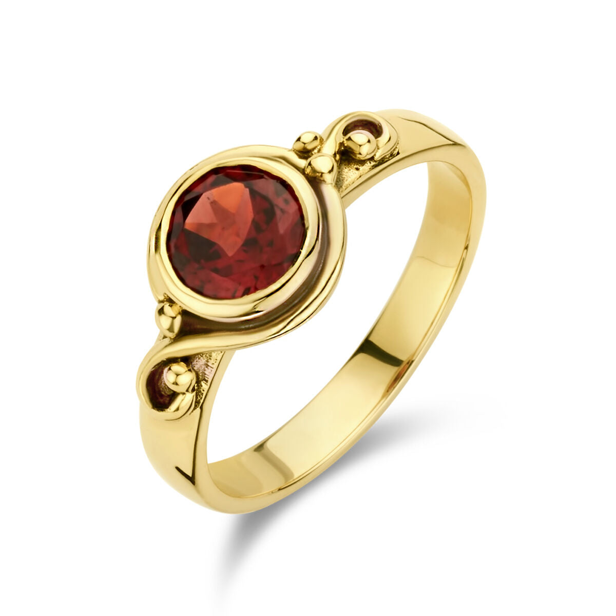 Bague vintage en or jaune 14K avec un grenat ovale central et des détails arrondis.