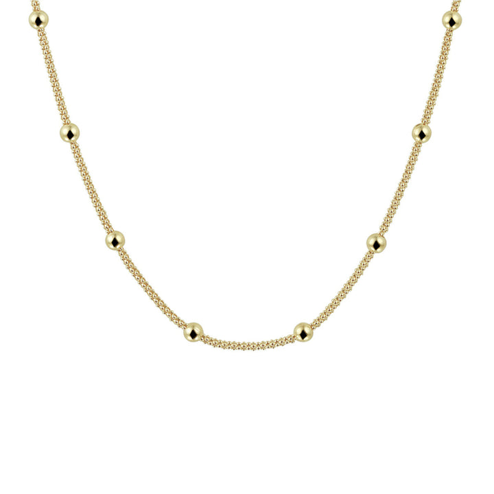 Het collier bolletjes 3,0 mm 40 + 4 cm 3 micron zilver verguld (geel) van Van der Kooij Collectie is een minimalistisch sieraad met gelijkmatig verdeelde gouden kralen, getoond op een witte achtergrond.