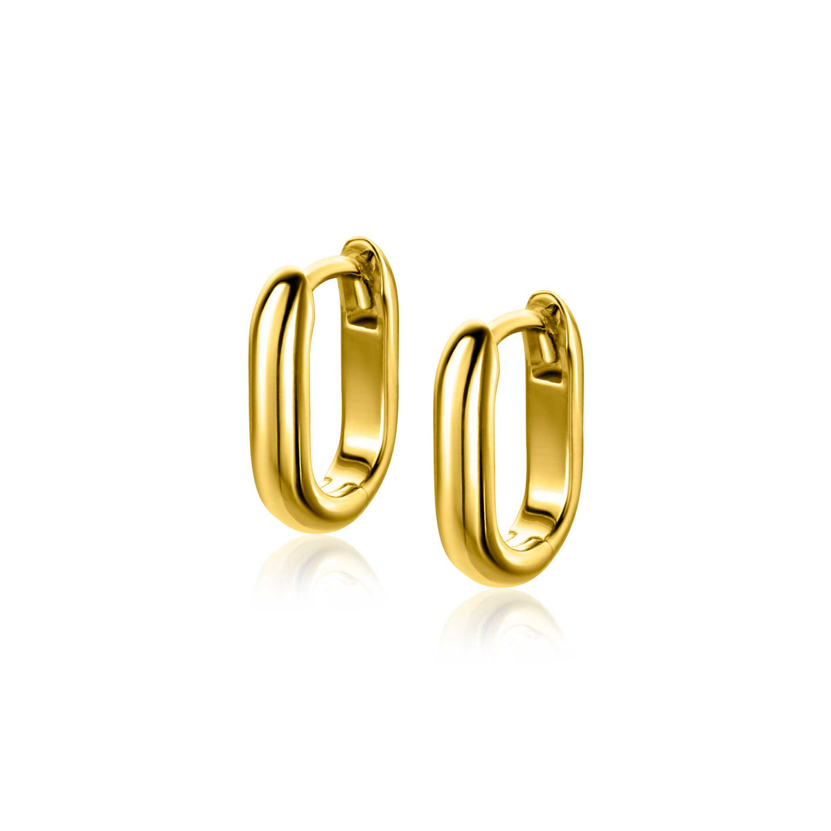 Boucles d'oreilles en argent avec une forme ovale et une finition brillante.