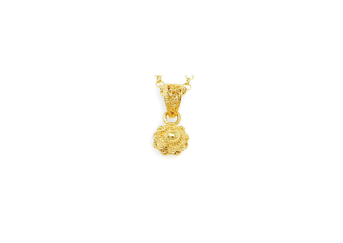 pendentif en or en forme de bouton de mer de 6 mm.