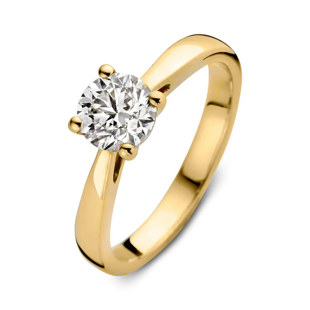 Bague en or jaune avec un diamant rond de 1,00 carat.