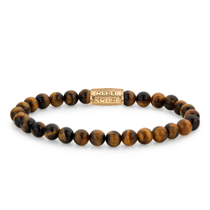 De Tiger Lily Gold - 6mm Kralen Armband Dames van Rebel & Rose combineert ronde tijgeroogkralen met een goudkleurige rechthoekige kraal met de merknaam erin gegraveerd.