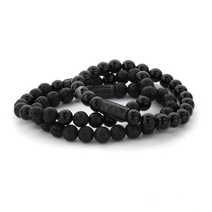 Twee Zwarte Maan - Volledig zwarte 8mm heren kralen armbanden van Rebel & Rose zijn samengerold op een witte achtergrond - perfect als stijlvol mannenaccessoire.