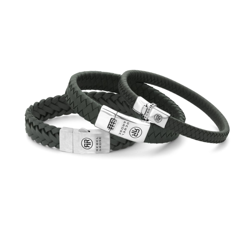 Drie Rebel & Rose Braided Raw Matt Ranger zwart leren herenarmbanden, met gevlochten textuur en gegraveerde zilveren sluitingen, worden kunstig overlapt op een witte achtergrond.