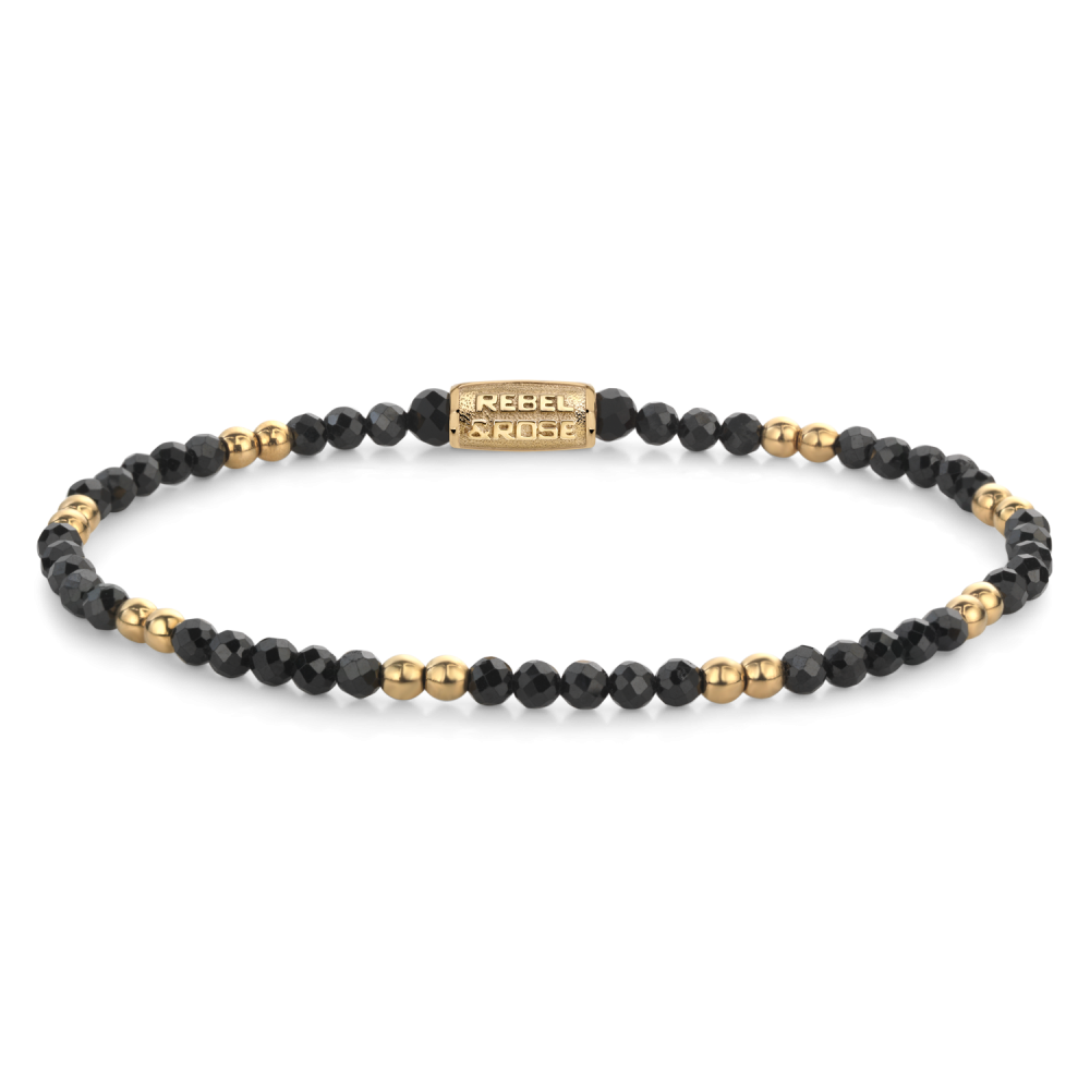 Bracelet en perles noires de 3 mm avec des accents dorés.