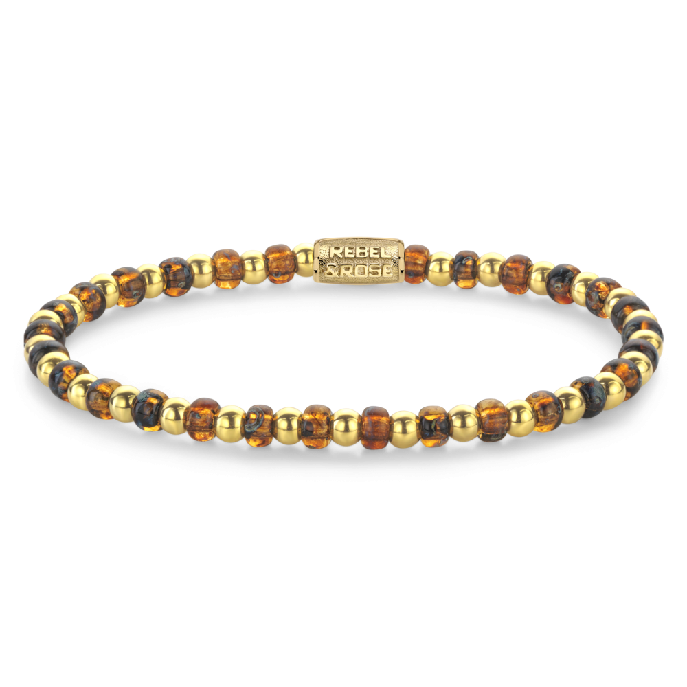 Bracelet en verre avec perles dorées et perles en verre marron, design élégant et moderne.