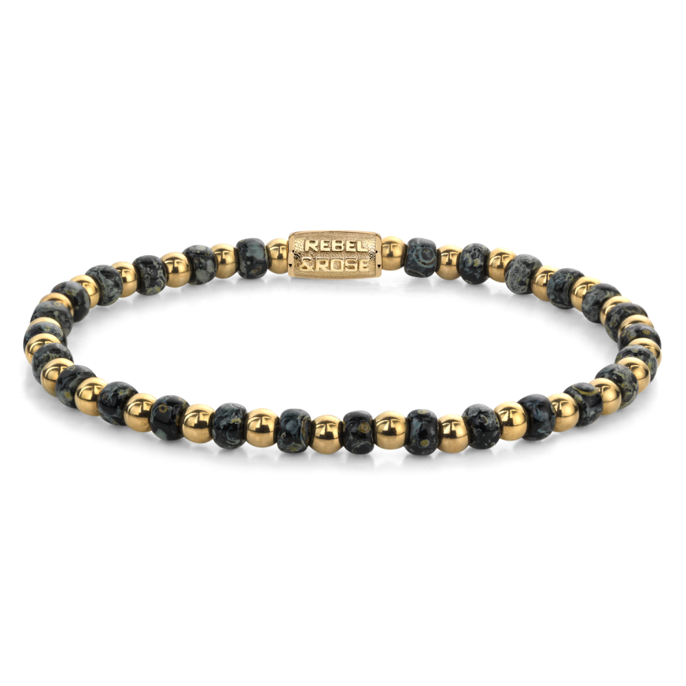 Bracelet en perles noires et dorées avec des détails en verre, d'un diamètre de 4 mm.