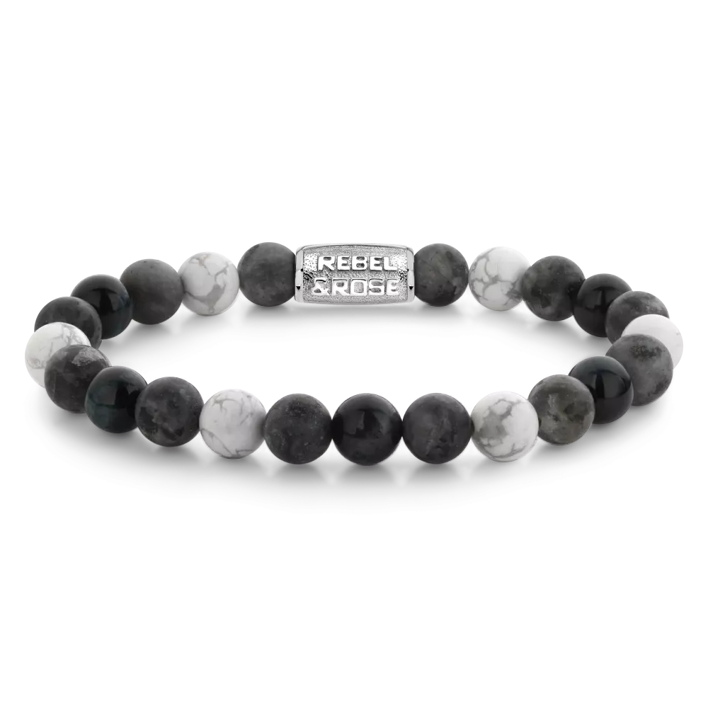 Bracelet en perles de 8 mm, mélange de pierres noires et blanches, fermoir argenté.