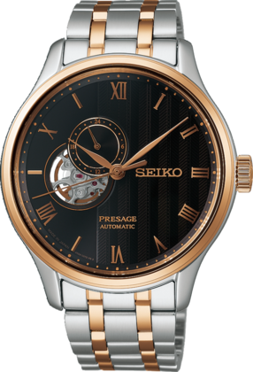 Montre automatique Seiko Presage avec boîtier en acier inoxydable argenté et doré, cadran noir et index romains.