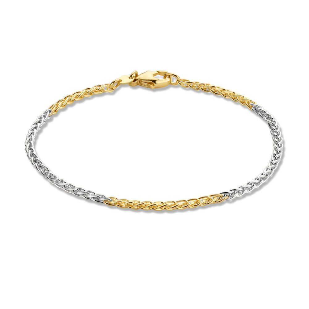 Bracelet en or 14 carats, avec une finition en or jaune et blanc, tressée.