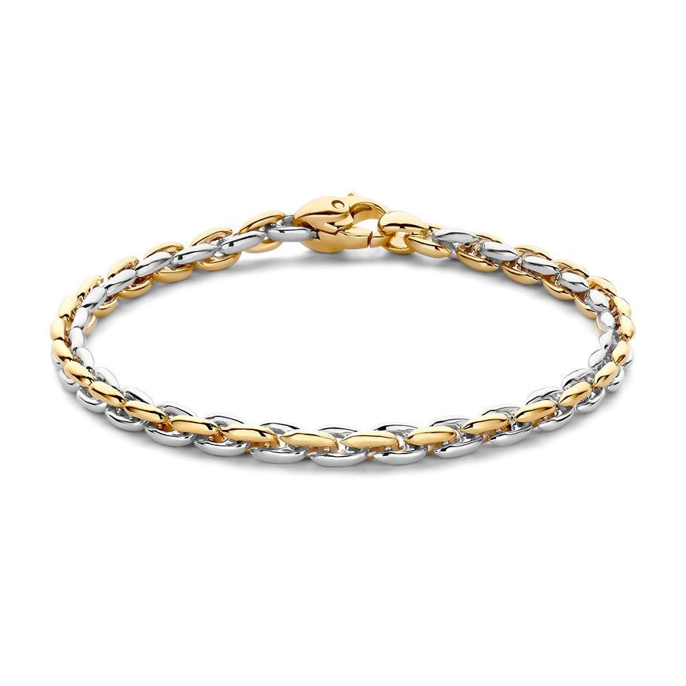 Bracelet bicolore en or et argent, avec maillons entrelacés.