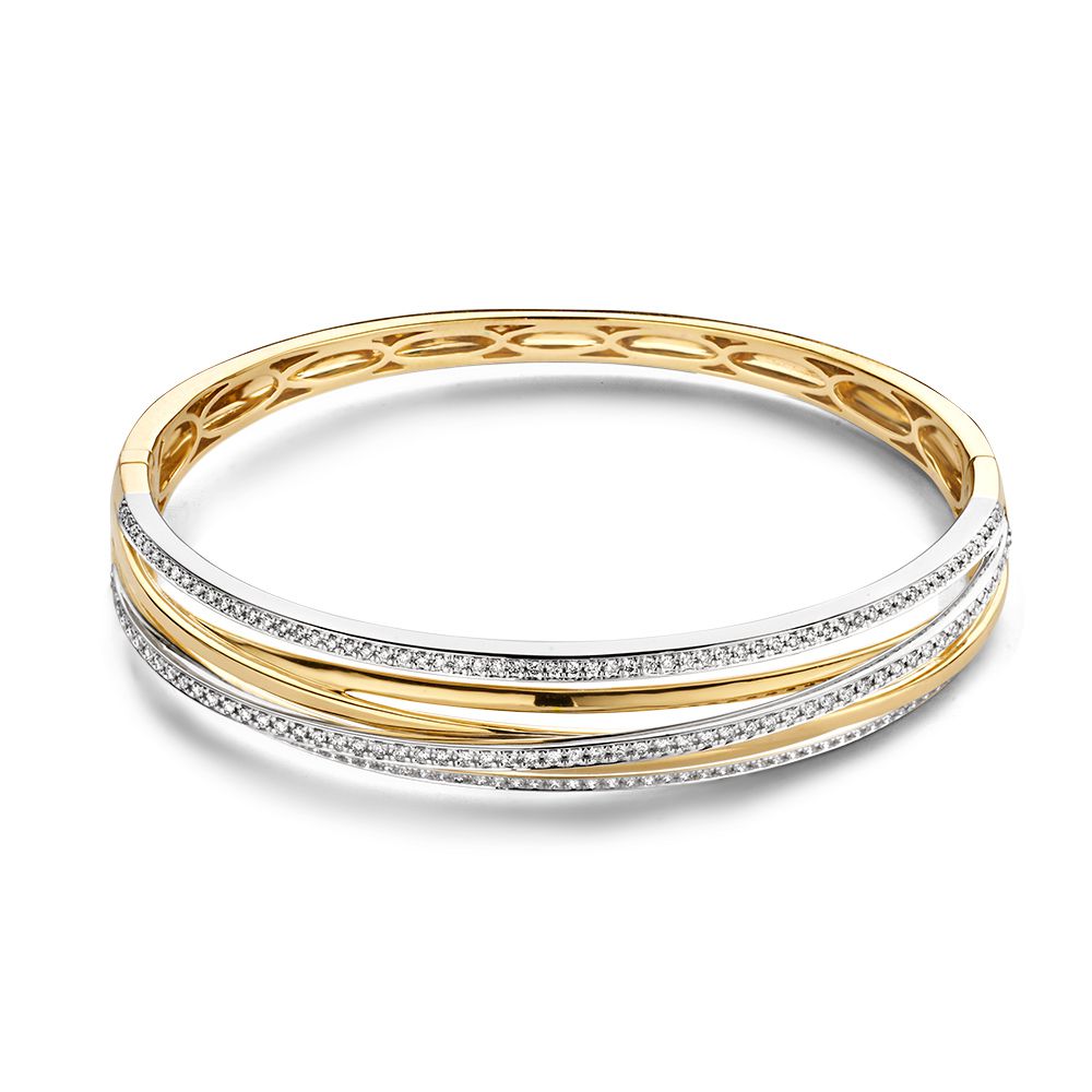 Bracelet en or jaune et blanc avec des diamants de 1,03 carat, finition brillante.