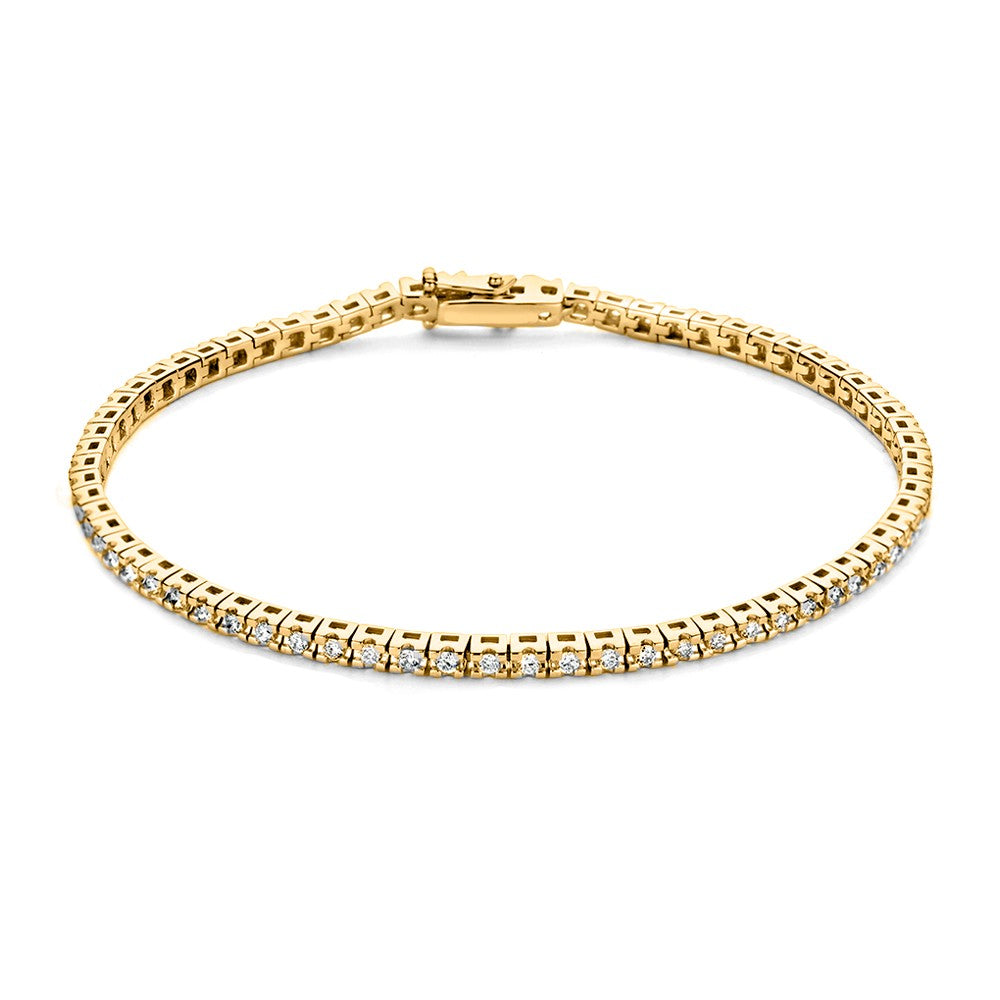 Geelgouden armband met een rij van sprankelende steentjes, elegant en verfijnd.