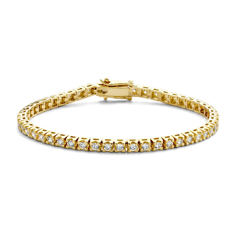 Bracelet en or jaune avec des pierres brillantes, design délicat et fermoir sécurisé.