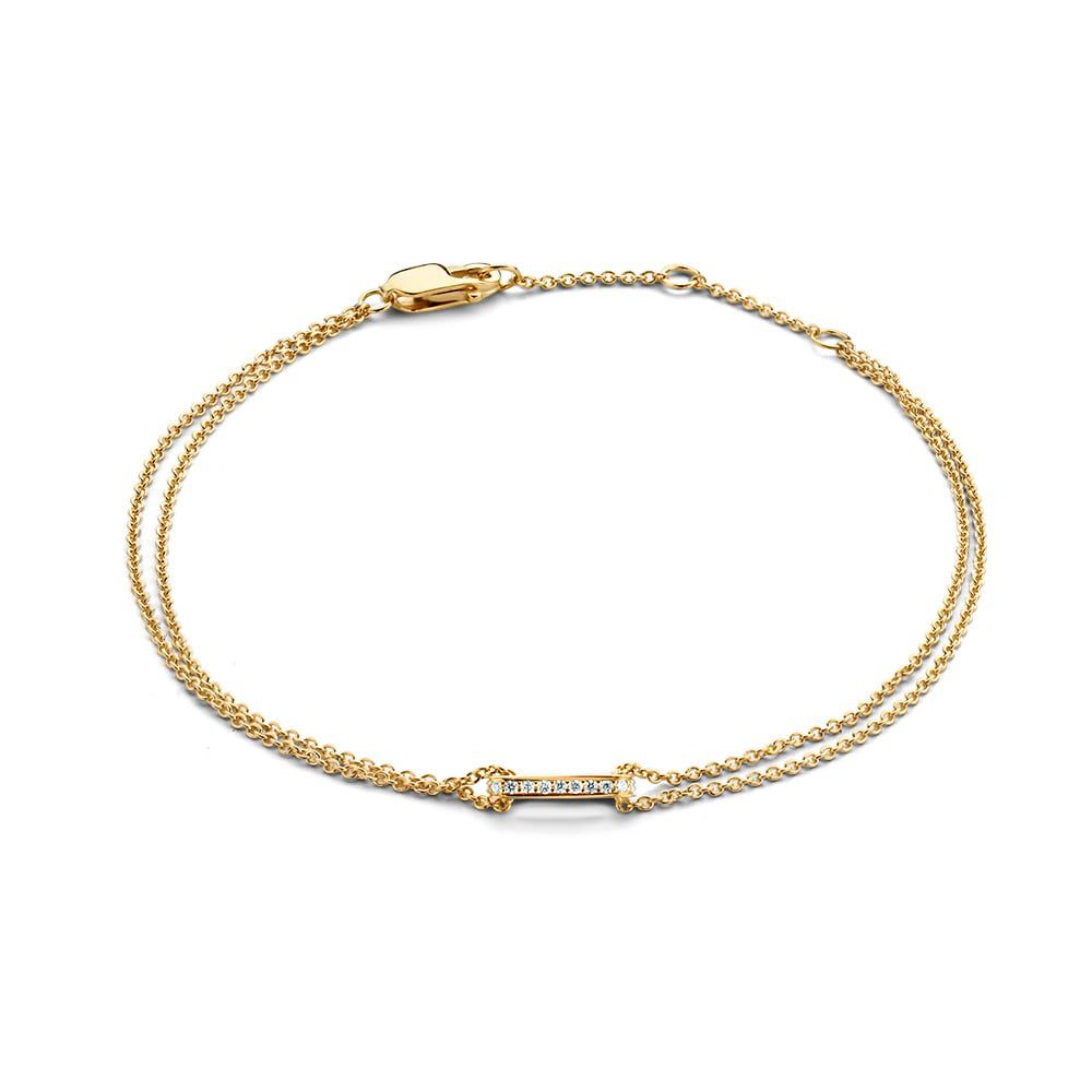 Bracelet en or jaune 14 carats avec diamants scintillants de 0,06 carat, design élégant.