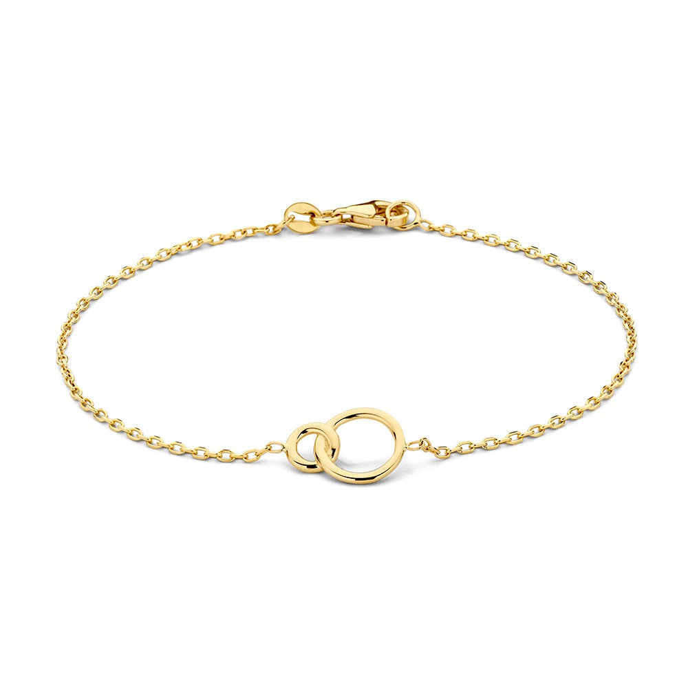 Bracelet en or avec maillons ancrés solides et cercles entrelacés.