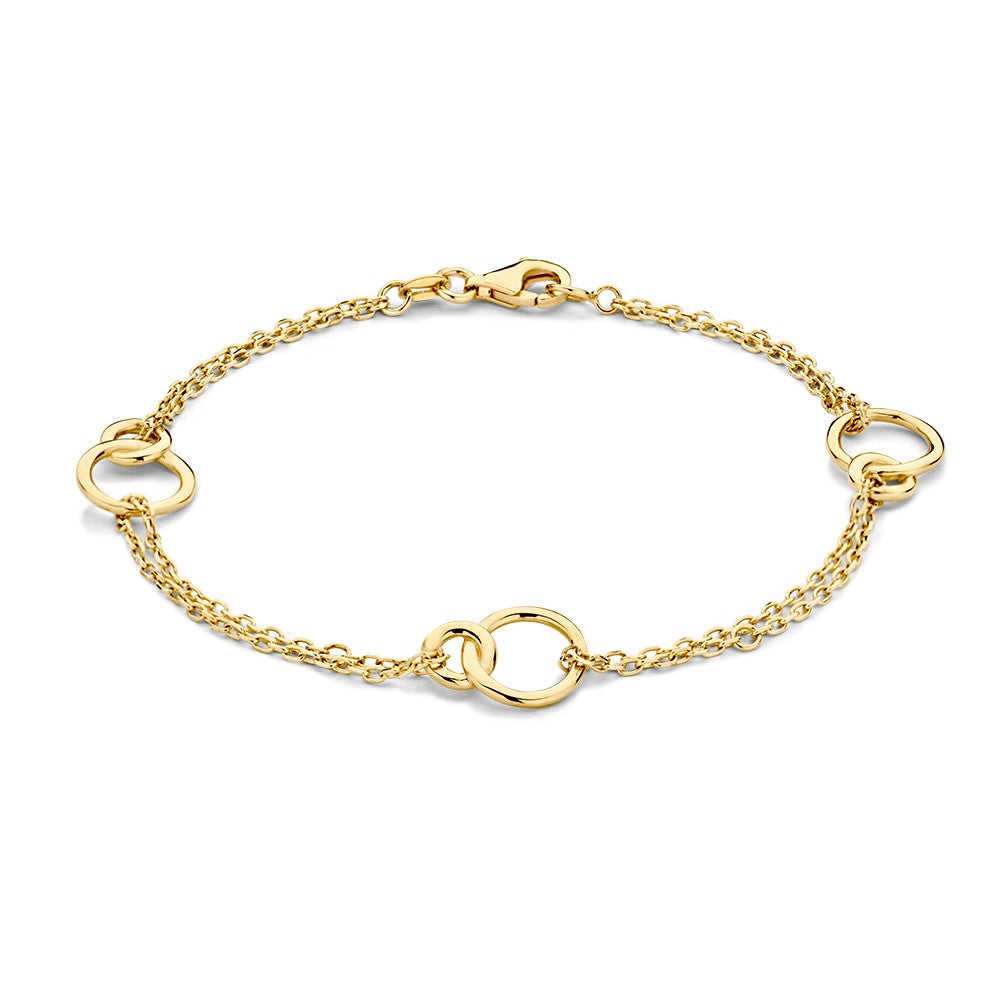 Bracelet en or jaune avec des éléments de cercles reliés et double rangée.