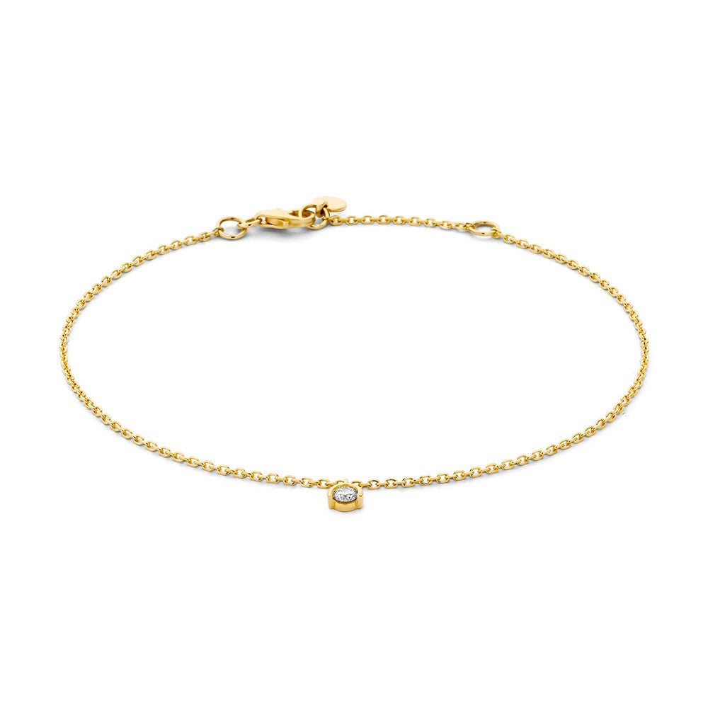Bracelet en or jaune avec un brillant de 0,08 carat.