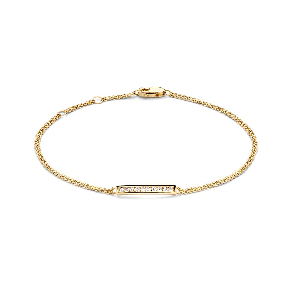 Bracelet en or jaune 14 carats avec diamants, design élégant et intemporel, longueur de 18 cm.
