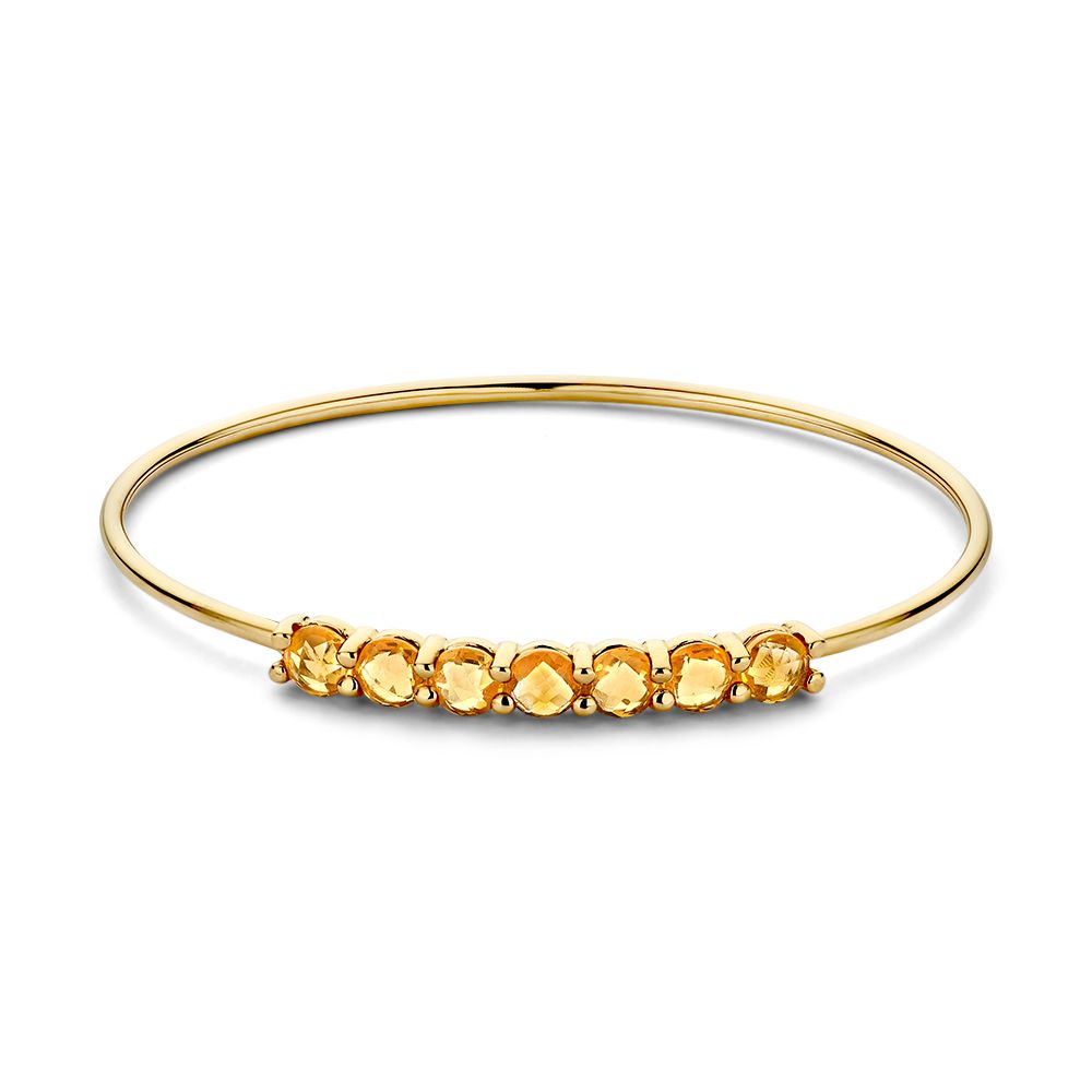 Bracelet jonc en or jaune 14 carats avec des citrins, finition brillante et teinte chaude.