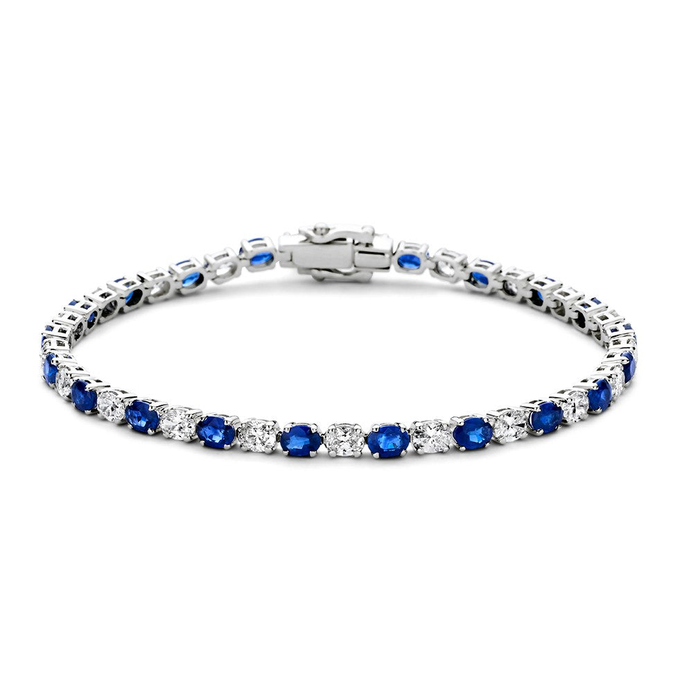 Bracelet en or blanc luxueux avec diamants et saphirs bleus, 14 carats, 3,05 crt.