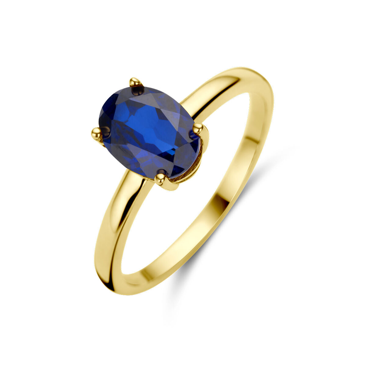 Bague en or jaune 14K avec un saphir ovale bleu.