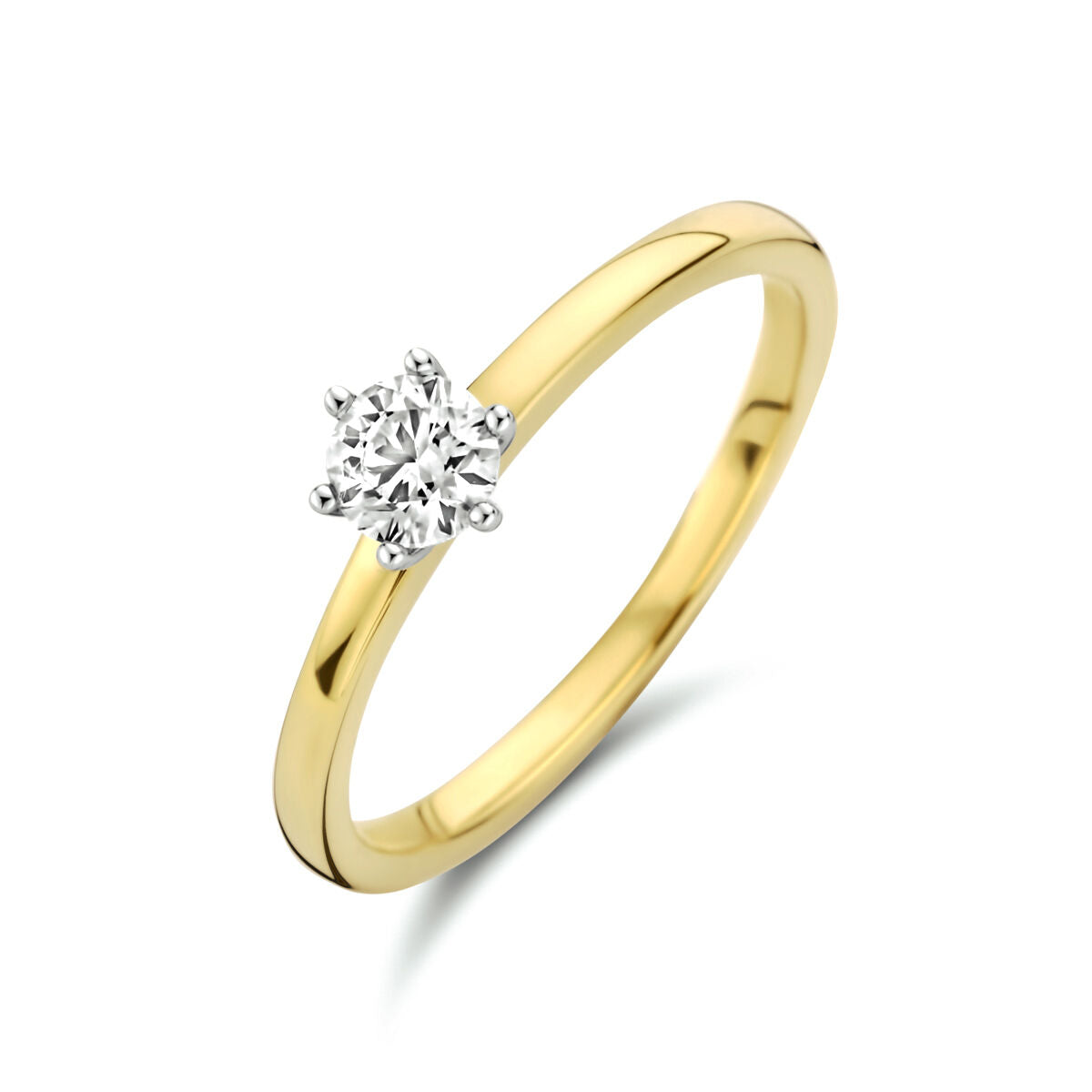 Bague en or bicolore jaune et blanc avec un diamant de 0,25 ct.