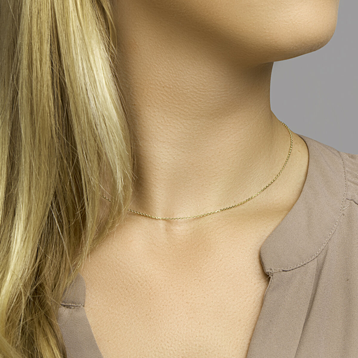 Collier en or jaune 18k avec maille ancre