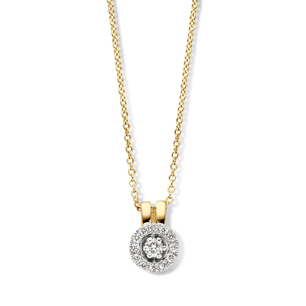 Pendentif en diamant entouré sur chaîne en or, avec un motif floral et des pierres brillantes.