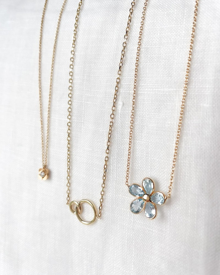 Gouden Collier met Geslepen Ankerschakel en Verbonden Cirkels – 14-Karaat Elegantie voor Dames