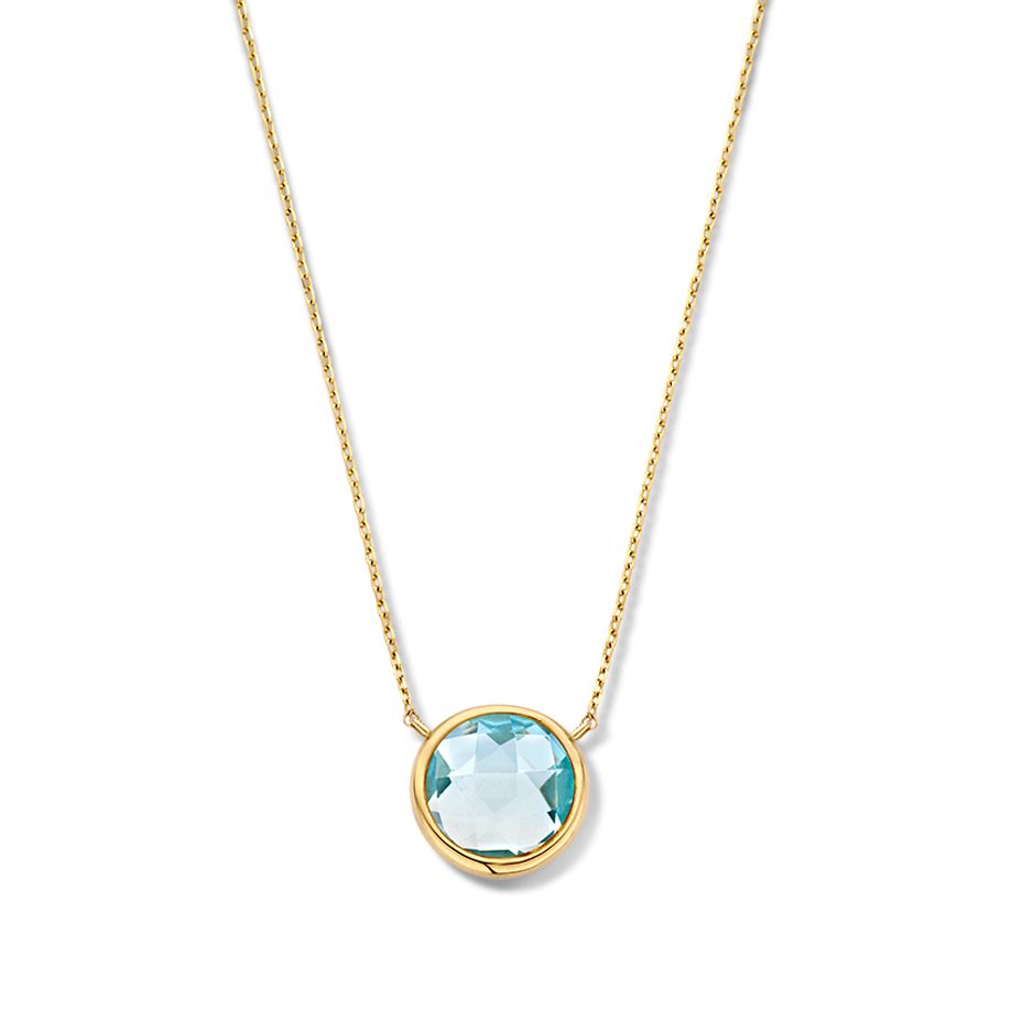 Collier en or jaune avec pendentif en topaze bleue facettée.