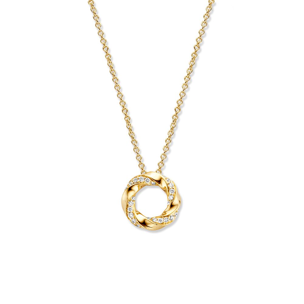 Collier en or jaune avec pendentif en diamants fins en forme de cercle.