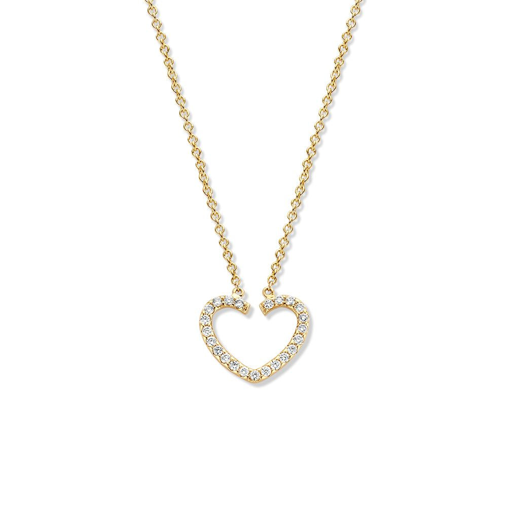 Collier en or jaune avec pendentif en forme de cœur orné de diamants.