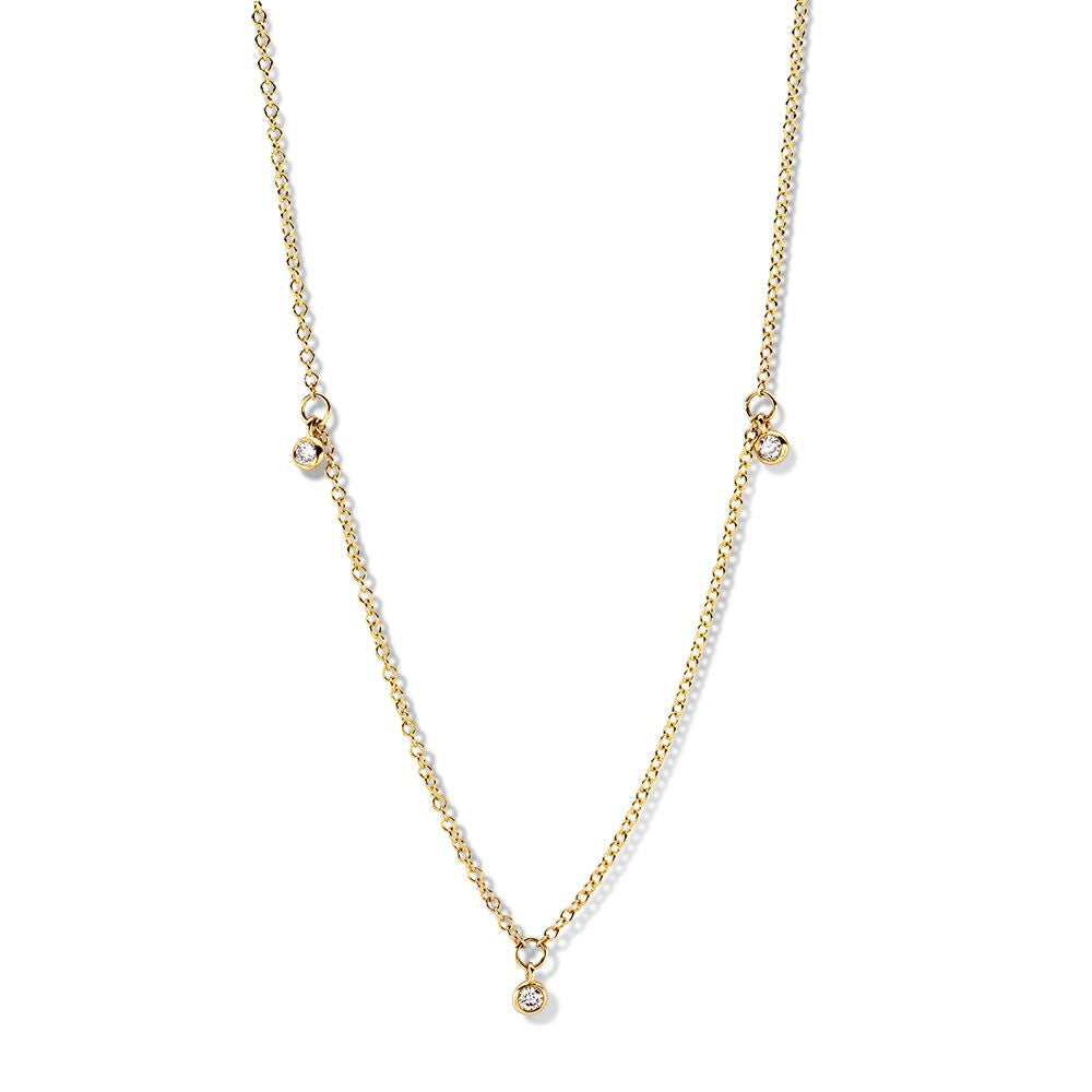 Collier en or jaune 14 carats avec diamants, chaîne délicate et pendentifs brillants.