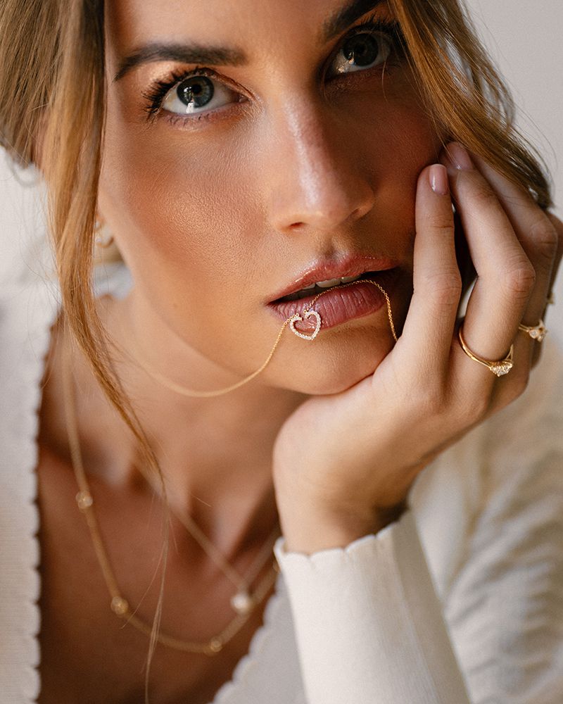 Collier en or jaune avec pendentif en forme de cœur et diamant - 14 carats