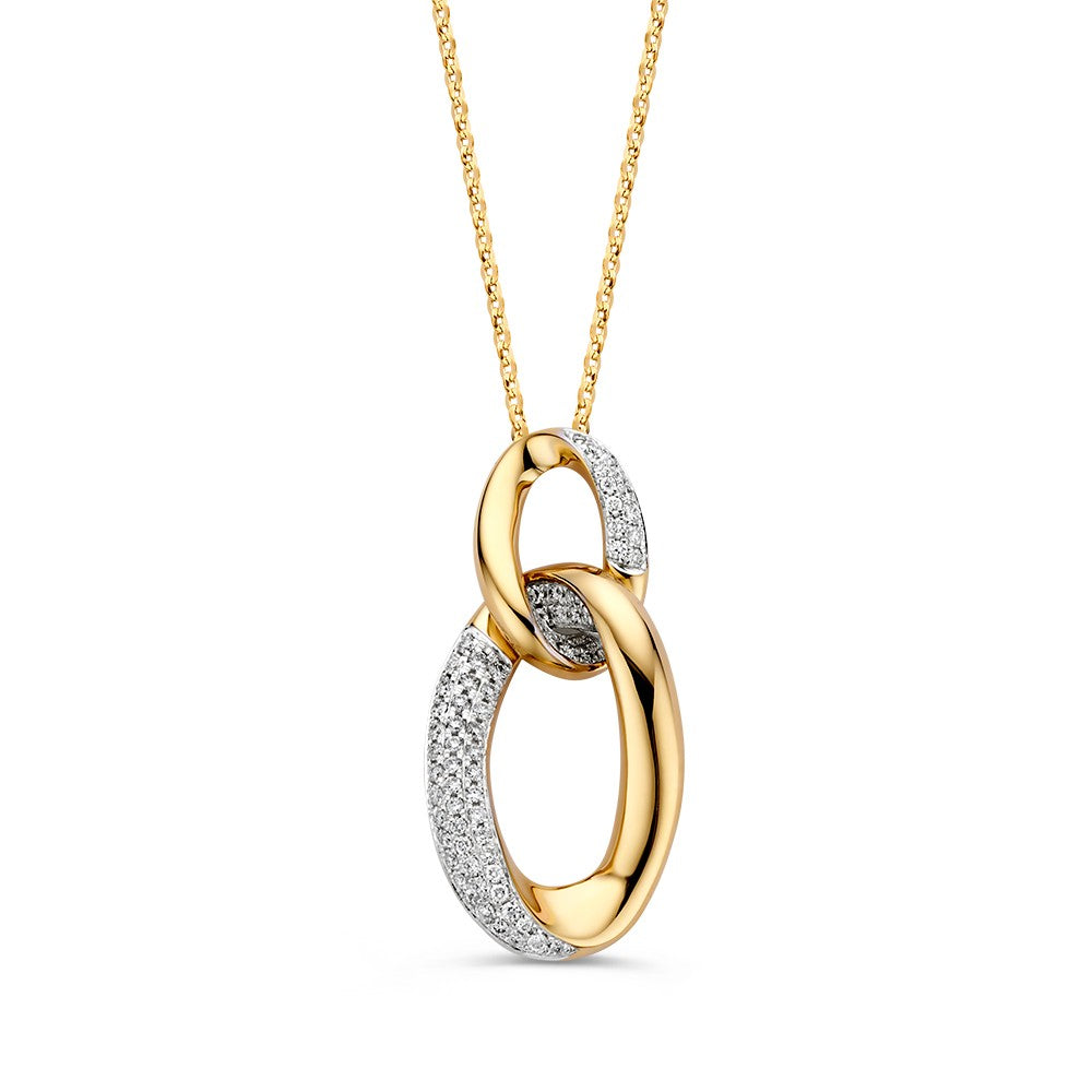 Pendentif en or jaune avec diamants, suspendu à une chaîne délicate.
