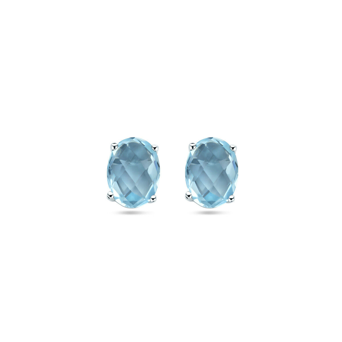 Boucles d'oreilles en topaze bleue, montées sur argent rhodié, forme ovale.