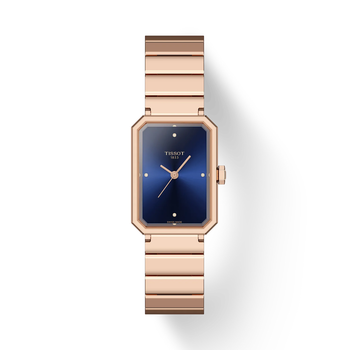 Montre Tissot SRV 30MM rose avec cadran bleu, boîtier octogonal et bracelet en acier.