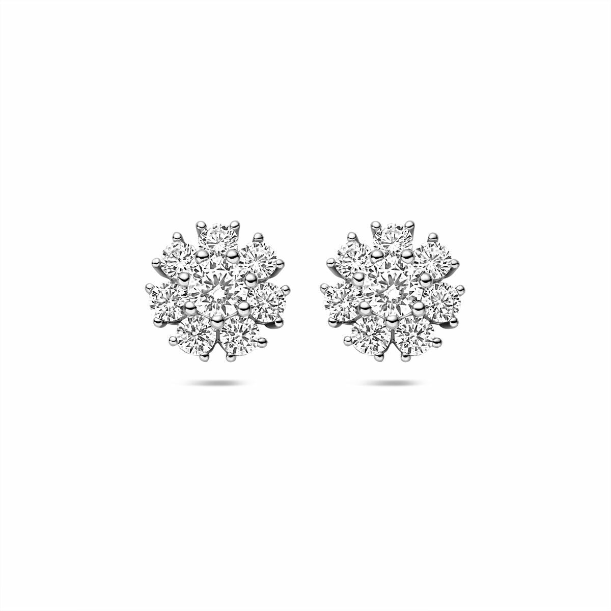 Boucles d'oreilles en argent rhodié ornées de zirconiums, en forme de fleur.