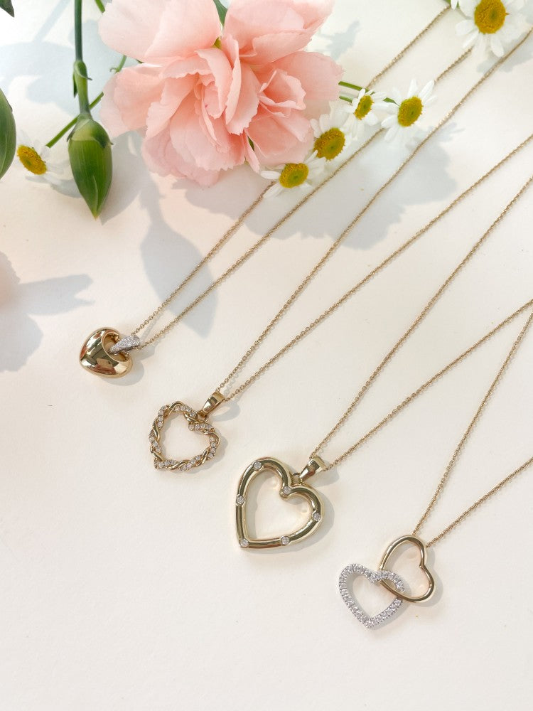 Pendentif en or de deux cœurs entrelacés – or jaune/blanc 14 carats – zircone