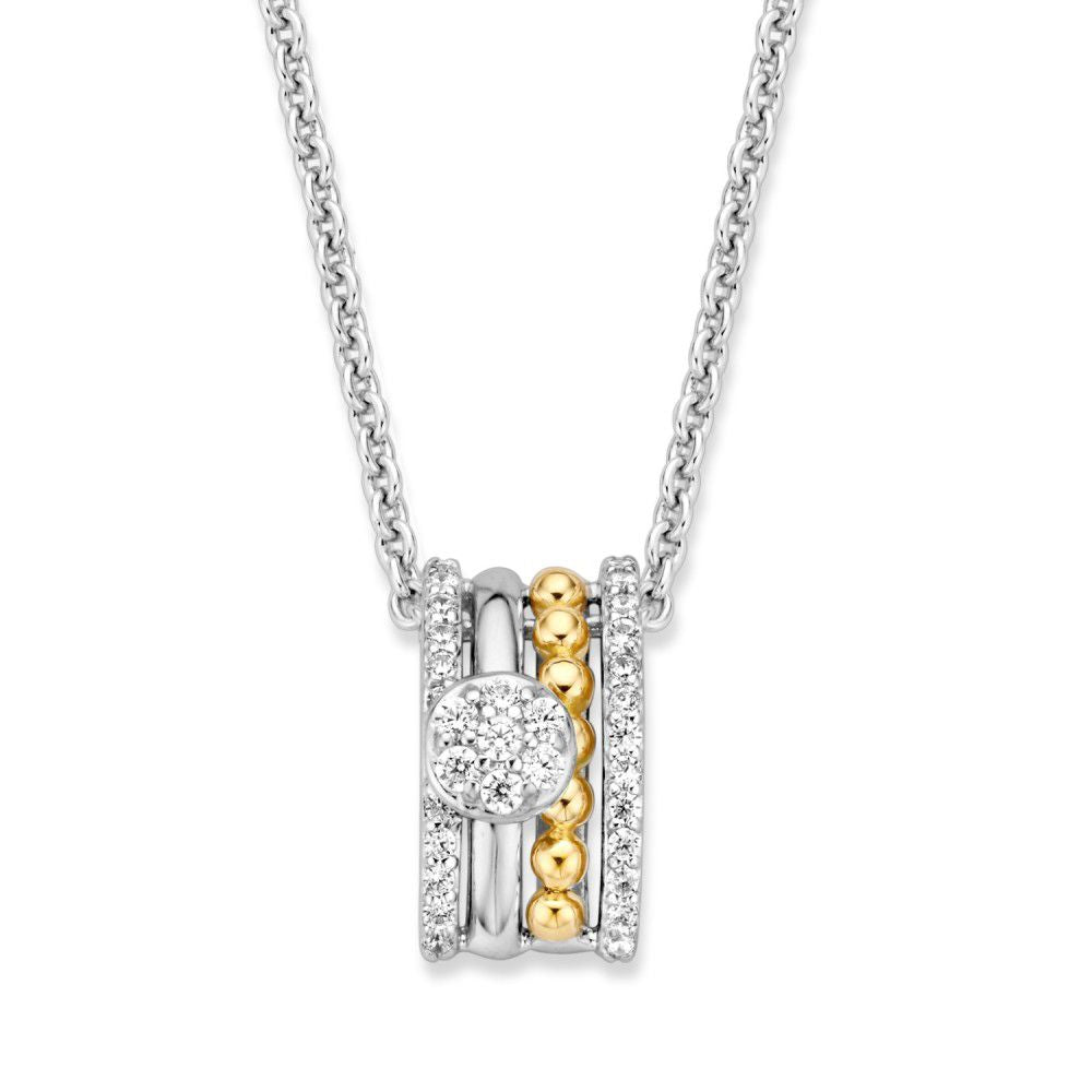 Pendentif argenté et doré avec zirconia blanche, forme cylindrique, détails brillants.