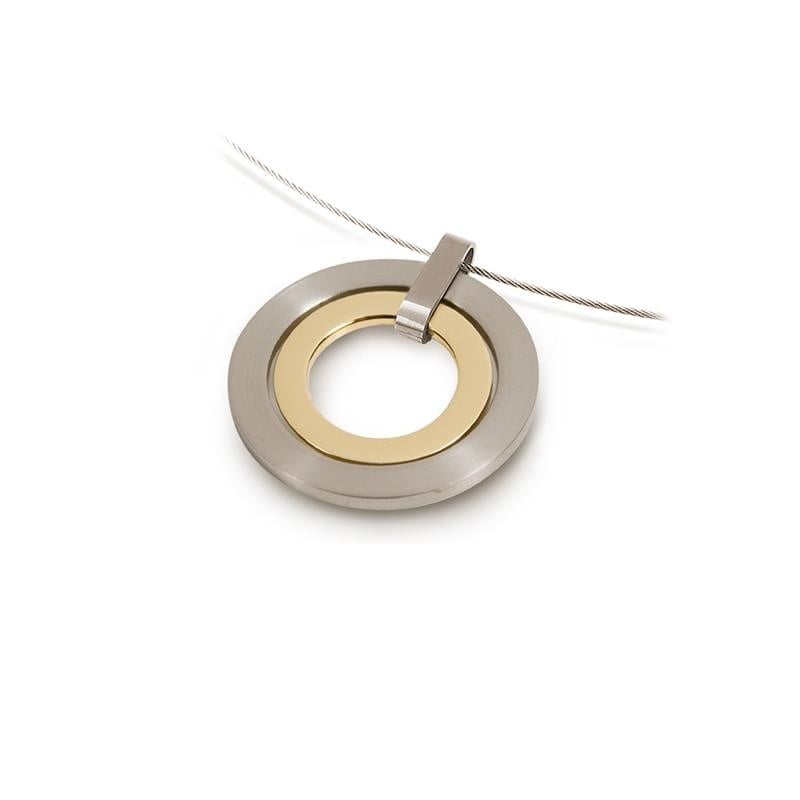 Pendentif bicolore en titane avec un cercle argenté et un intérieur doré.