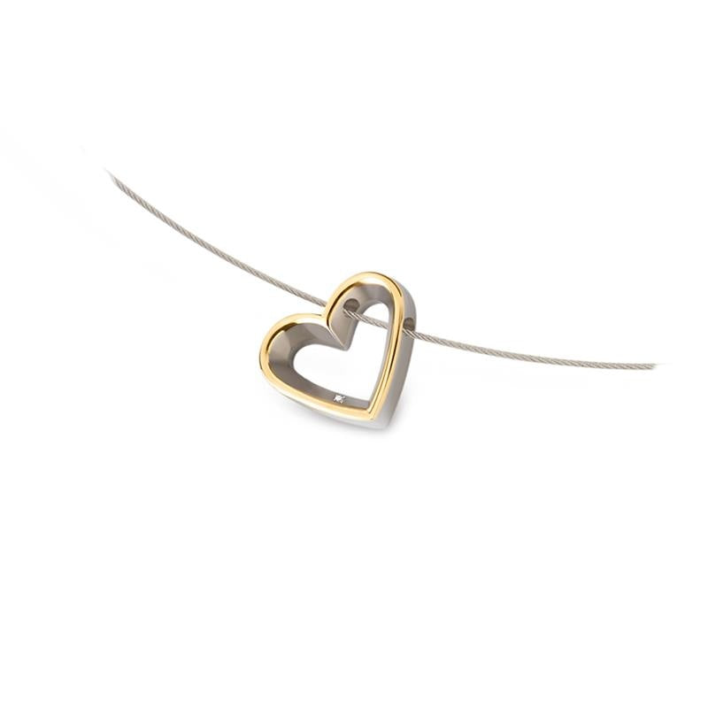 Pendentif en titane bicolore en forme de cœur avec un détail doré.