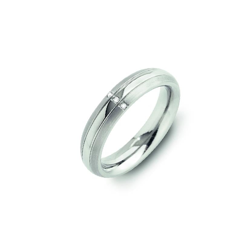 Bague en titane avec deux diamants, finition brillante et design lisse.