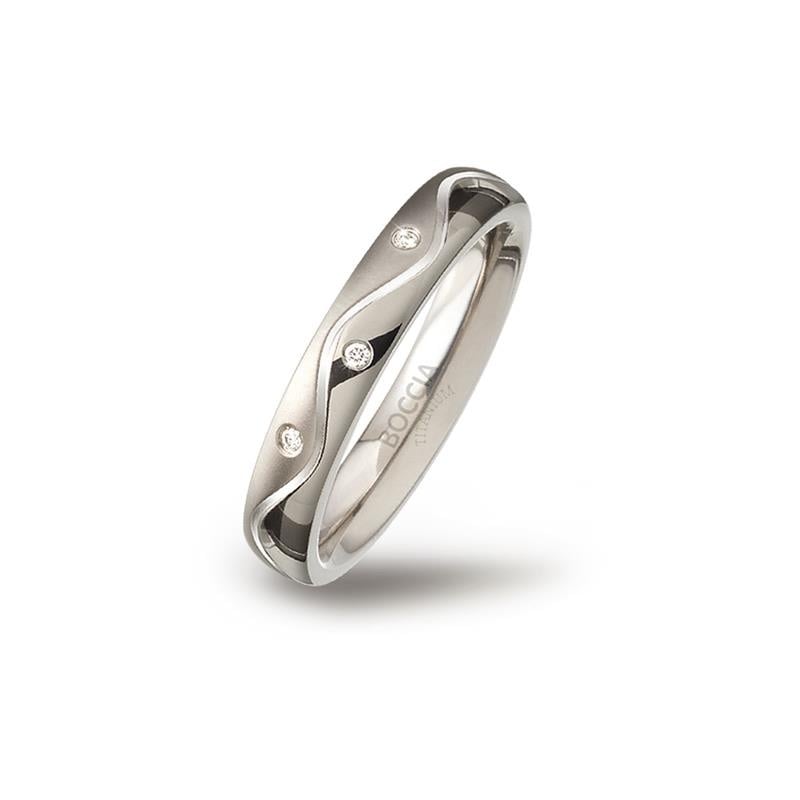 Bague en titane avec des diamants, finition brillante et design ondulé.