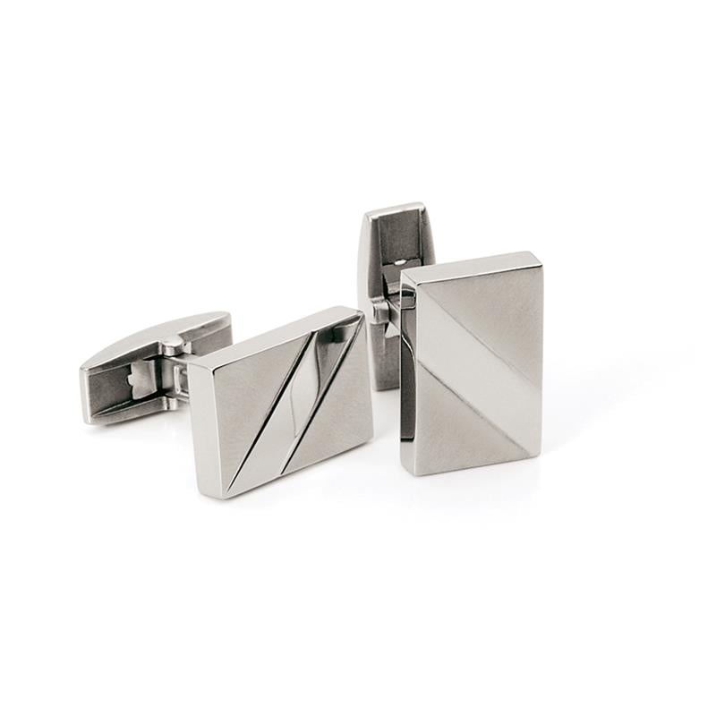 Boutons de manchette en titane avec un design géométrique et une finition polie.