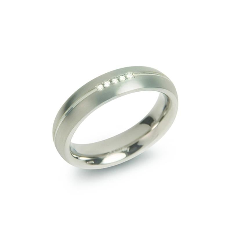 Bague en titane avec cinq diamants sertis, finition polie et mate.
