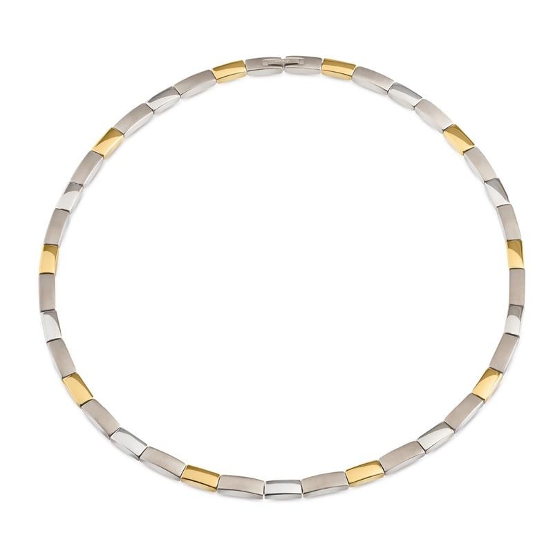 Collier bicolore en titane avec des maillons argentés et dorés.